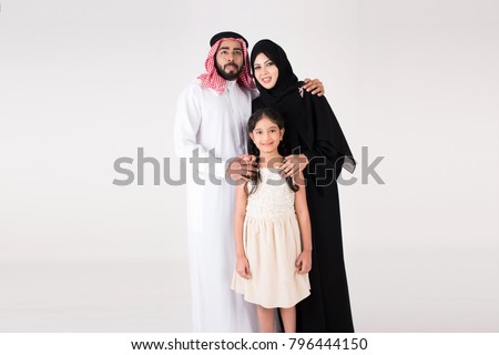 Arab family standing on white background