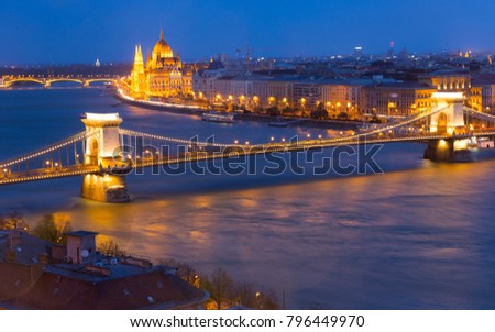 Night view of Hungarian Parliament building and Budapest Chain Bridge, Danube river