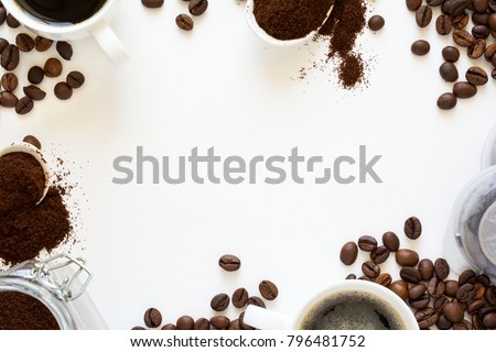 Background with assorted coffee: cups of espresso, coffee beans, powder and capsules on white background. Space for copy. Top view. Flat lay Royalty-Free Stock Photo #796481752
