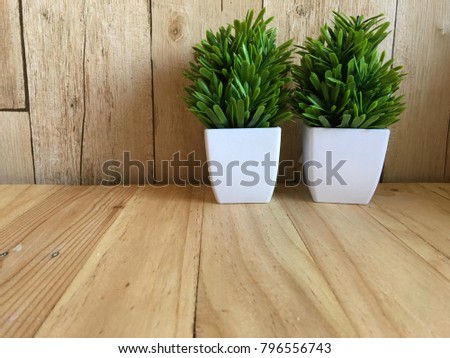 tree Wood table top and blurred flowers background with vintage filter Royalty-Free Stock Photo #796556743