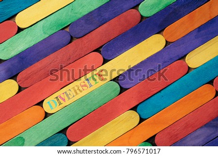 Colorful wooden stick with DIVERSITY word. diversity concept Royalty-Free Stock Photo #796571017
