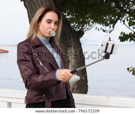 Young pretty girl, selfie, outdoor