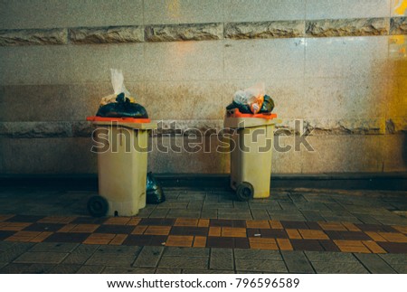 Royalty high quality free stock image of two dustbin. Two dustbin on street in night