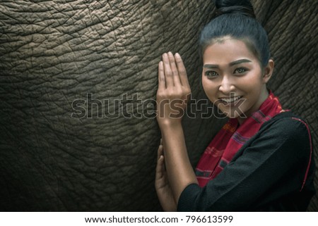 Beautiful asian girl and big elephant.