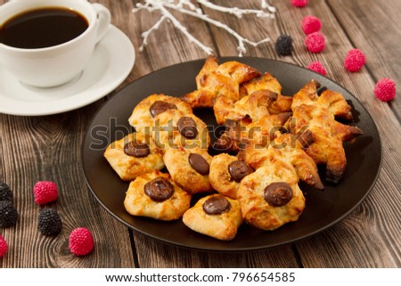Sweet curd biscuits on wooden background