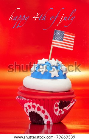 Happy 4th of july and a cupcake decorated with the colors and stars of United States flag