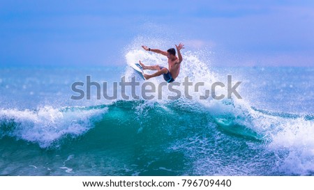 Riding the waves. Costa Rica, surfing paradise. Josue Rodriguez, a talented Costa Rican surfer Royalty-Free Stock Photo #796709440