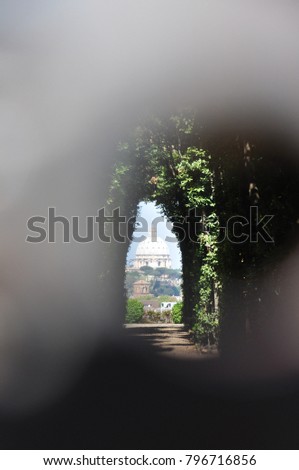 View on San Pietro Cathedral from a keyhole at Piazza dei Cavalieri di Malta