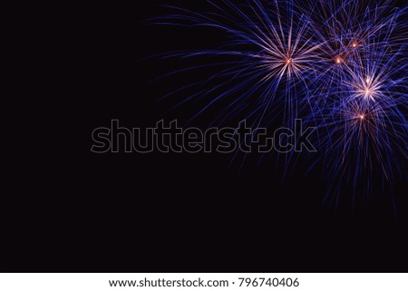 Colorful firework on the night sky. New Year celebration fireworks. Abstract firework isolated on black background with free space for text