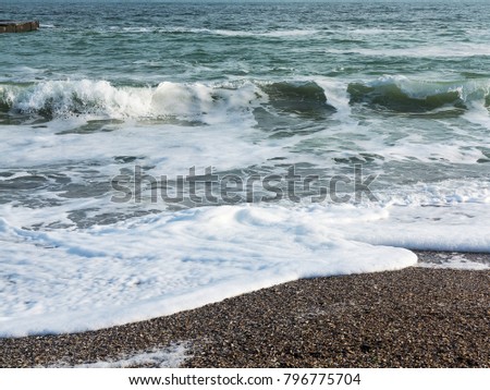 Seascape. Waves. Black sea in cold and windy winter day, as background