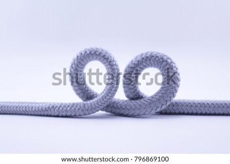string knotted on a white background.  