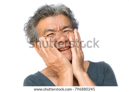 Old woman have toothache on white background