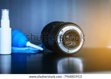 Camera lense cleaning with reflections