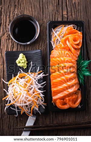 Salmon Sashimi on wooden table