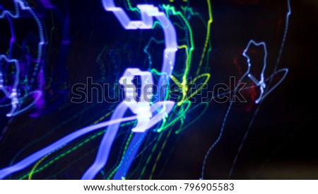 abstract picture of Multicolored light moving at night.