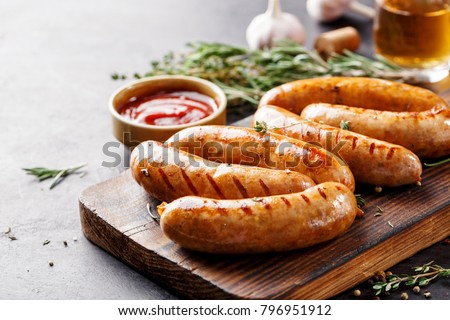 Sausages fried with spices and herbs, Selective focus Royalty-Free Stock Photo #796951912