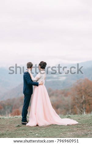 modern wedding in the mountains in Sochi and the sea, a wedding in a European style 
