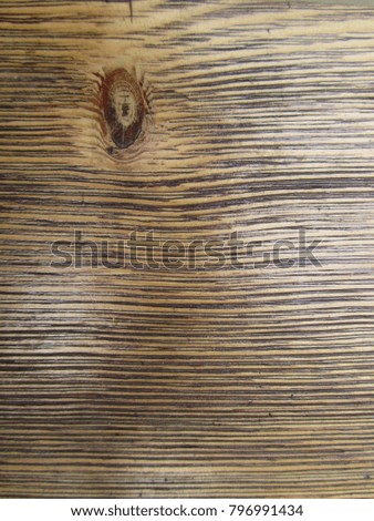 Texture of the board with a knot