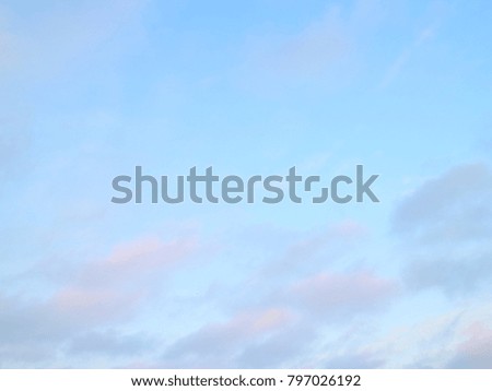 blue winter sky with cumulus gray clouds