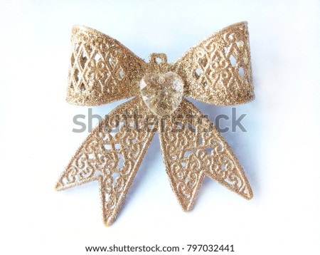 Gold ribbon glitter on a white background, Top view