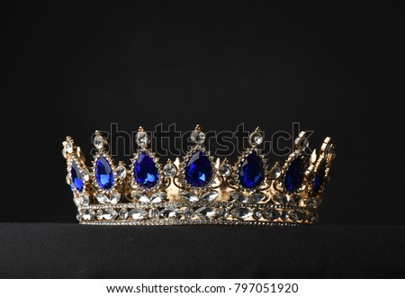 beautiful crown on black background Royalty-Free Stock Photo #797051920