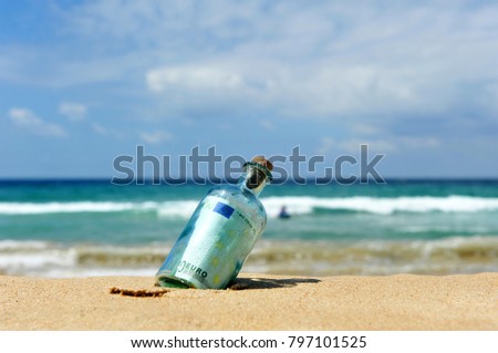 Banknote of one hundred (100) euro inside a bottle found in a beach of southern europe