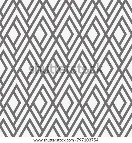 Vector seamless pattern. Modern stylish texture. Repeating geometric tiles with a grid of rhombuses.