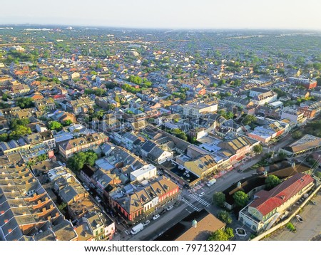 Aerial view French Quarter with extant historical buildings from 19th century. The historic district section of the city of New Orleans, Louisiana, USA, morning warm light.