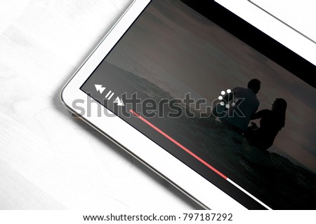 Slow internet connection. Bad online movie streaming service. Loading icon rolling on video. Film player stopped and buffering. Problem with wifi. Royalty-Free Stock Photo #797187292