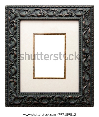 Empty picture frame isolated on white, portrait format, in a dark decorative carved painted finish with matte