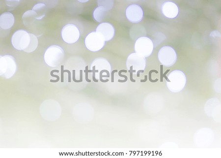 silver and white bokeh abstract background, place for holiday text