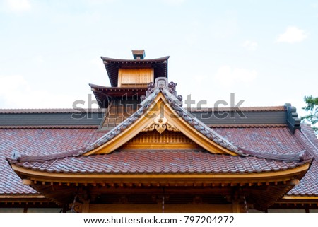 Traditional brawn roof castle architecture ,Traditional wood roof against the sky, Traditional Japanese roof in Japan.