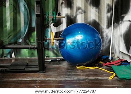 concept of a blue fitness ball isolated on colorful background