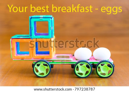 the car is carrying chicken eggs. The inscription "Your best breakfast - eggs"