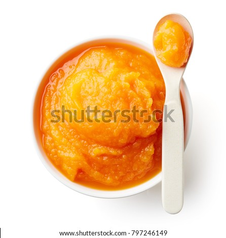 Pumpkin and carrot baby puree in bowl with baby spoon isolated on white background, top view Royalty-Free Stock Photo #797246149