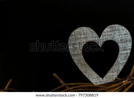 Greeting card. Heart on a black background