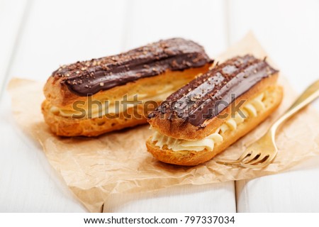 Traditional french eclairs with chocolate. Royalty-Free Stock Photo #797337034
