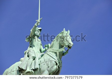 a picture of the Joan of arc statue at Sacre Coeur in Paris France