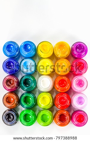 top view of color packed in clear bottles. Put together a rectangle on white background. Poster color for student range cheap price easy to paint for student. color are bold bright and opaque.