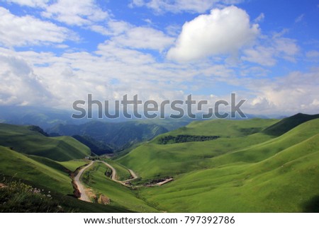 the green valley in the Caucasus Mountains