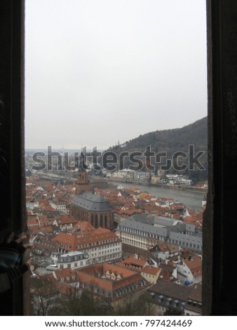 View of the city from the window, houses and the river fit at the landscape
