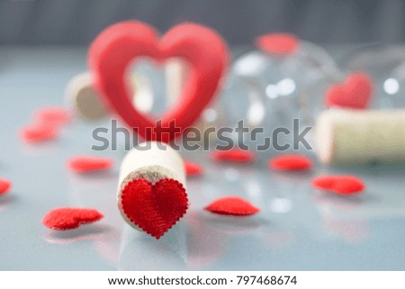 Red heart on table 