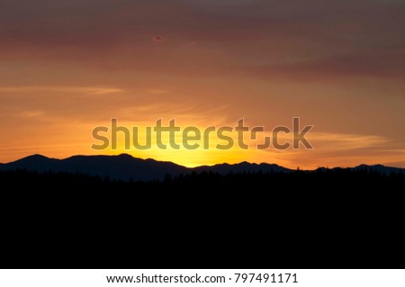 Sunset on the Olympic Mountains photographed from an overlook near Shelton, WA, USA.