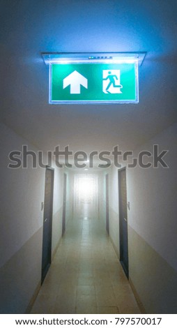 Building Emergency Exit with Exit Sign on door, lighting at the door