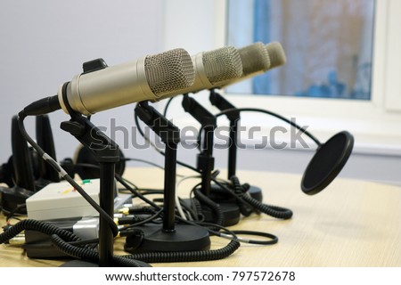 Microphones in the Studio on a light background.