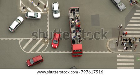 aerial view of cars and people, busy traffic in big intersection. Paris