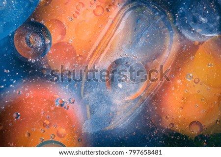 oil with bubbles on a colorful background Toned