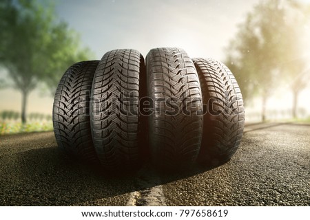 Summer tires on a street Royalty-Free Stock Photo #797658619