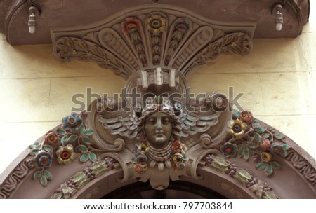 Baroque european decoration from a door arch in Aviles. Northern Spain modenism in a fachade.