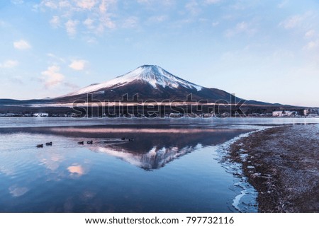 Reflection of Mt.Fuji at lake yamanaka with blue sky
